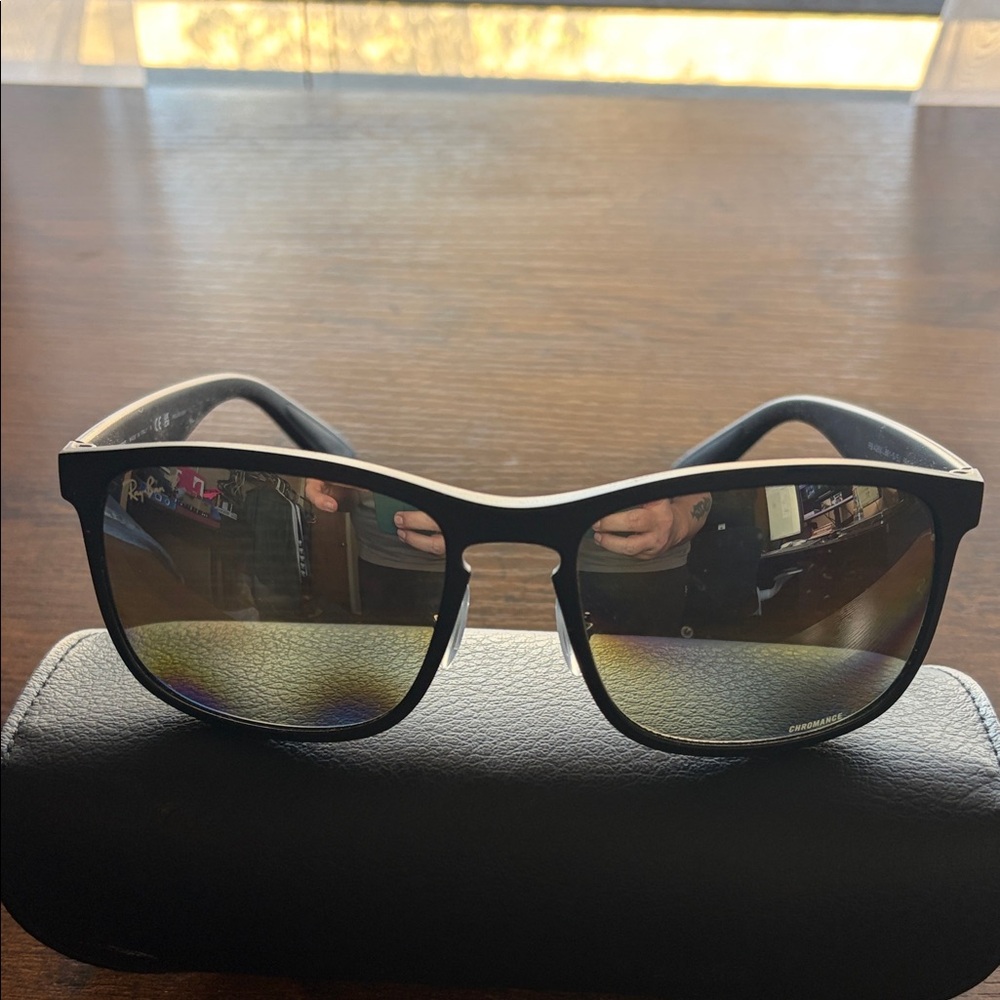 Ray-Ban Black Sunglasses with Silver Lenses